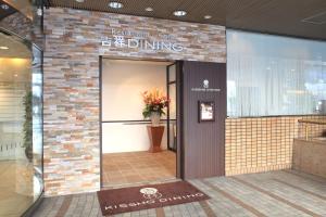 a lobby of a building with a sign that reads restaurant dining at Kichijoji Tokyu REI Hotel in Musashino +25 photos