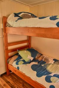 Postel nebo postele na pokoji v ubytování Hostal Triwe