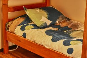 Postel nebo postele na pokoji v ubytování Hostal Triwe
