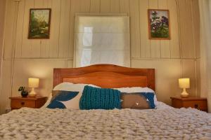 Postel nebo postele na pokoji v ubytování Hostal Triwe