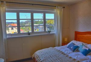 Postel nebo postele na pokoji v ubytování Hostal Triwe