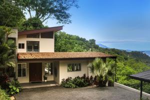 a house with a view of the ocean at Casa Sulit in Dominical