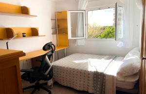 Posteľ alebo postele v izbe v ubytovaní Alicante Apartamento en la Playa Muchavista-San Juan - Marluma frente al Mar