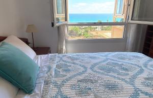 Posteľ alebo postele v izbe v ubytovaní Alicante Apartamento en la Playa Muchavista-San Juan - Marluma frente al Mar