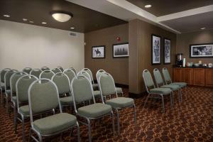 a row of chairs in a waiting room at Hampton Inn Beaumont in Beaumont