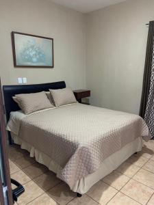 Ein Bett oder Betten in einem Zimmer der Unterkunft El Mesón de los Abuelitos