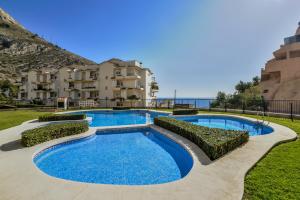 Swimmingpoolen hos eller tæt på OASIS BEACH MASCARAT