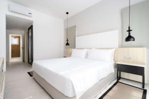 Postel nebo postele na pokoji v ubytování Radisson Blu Residences, Saidia + 37 fotografií
