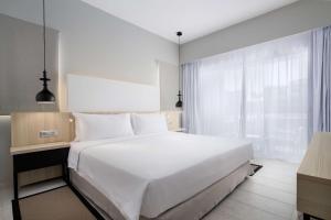 Radisson Blu Residences, Saidia客房内的一张或多张床位