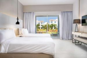 Radisson Blu Residences, Saidia客房内的一张或多张床位