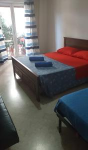 Postel nebo postele na pokoji v ubytování Casa Piacquadio