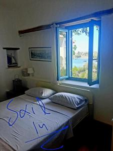 Postel nebo postele na pokoji v ubytování Sail in