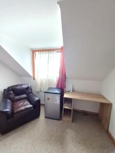 Χώρος καθιστικού στο Habitación con baño privado vista al volcán