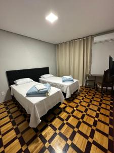 Ліжко або ліжка в номері Hotel Dom Marechal