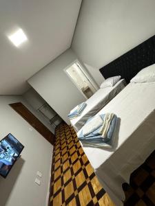 Postel nebo postele na pokoji v ubytování Hotel Dom Marechal neoclássico