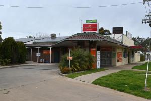 a gas station on the side of a street at The Shamrock Hotel Balranald in Balranald