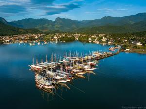 a bunch of boats are docked in a harbor at Pousada Sambaki in Paraty