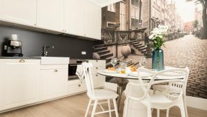 Kuchyňa alebo kuchynka v ubytovaní Apartament Ap94
