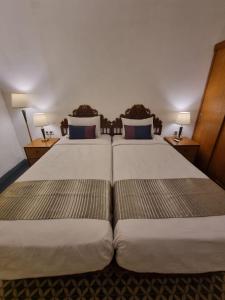 Postel nebo postele na pokoji v ubytování Attara Inn Senggigi