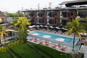 an aerial view of a hotel with a swimming pool at Shore Amora Canggu in Canggu