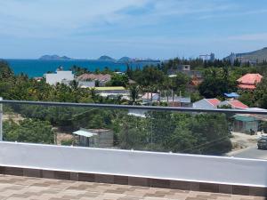 a view of the ocean from a balcony at HOTEL VTV DỐC LẾT in Ninh Hòa