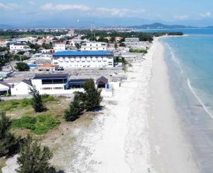 a view of the beach in front of a resort at HOTEL VTV DỐC LẾT in Ninh Hòa