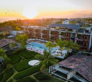 an aerial view of a resort with a swimming pool at Shore Amora Canggu in Canggu