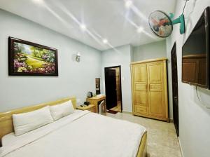 Giường trong phòng chung tại 1996 Da Lat Hotel