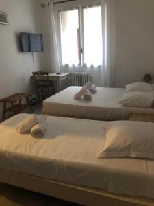 Rúm í herbergi á Hotel François 1Er