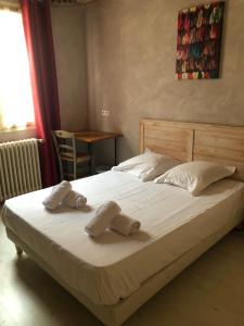 Rúm í herbergi á Hotel François 1Er