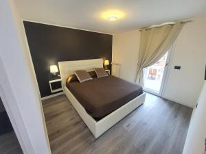 Postel nebo postele na pokoji v ubytování Guest House Brezza Marina