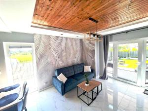 Posedenie v ubytovaní CHILL HAUS APARTAMENTY , Domki