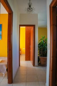 A bed or beds in a room at Villa Fotini with ocean view