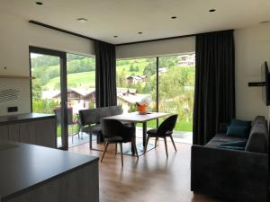 Posedenie v ubytovaní Appartements Pedescin