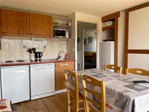 Kuchyň nebo kuchyňský kout v ubytování Appartement 2 chambres vue exceptionnelle