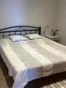 Postel nebo postele na pokoji v ubytování Villa Delfin