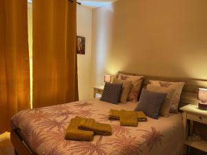 Posteľ alebo postele v izbe v ubytovaní Parking privé gratuit, balcon, 2 chambres