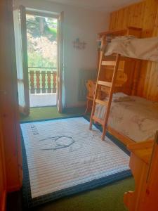 Postel nebo postele na pokoji v ubytování Un balcone sulla Val di Pejo