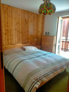 Postel nebo postele na pokoji v ubytování Un balcone sulla Val di Pejo