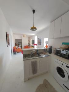 Køkken eller tekøkken på Superbe T3 terrasse avec vue Centre historique