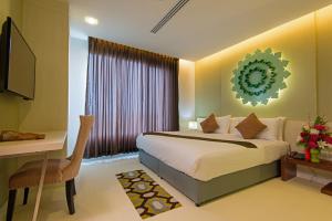 Кровать или кровати в номере Korapura Resort