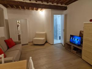 Televiisor ja/või meelelahutuskeskus majutusasutuses MonoLove Portoferraio