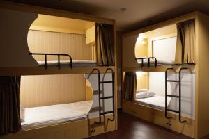 Postel nebo postele na pokoji v ubytování Hermes Hotel