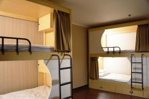 Postel nebo postele na pokoji v ubytování Hermes Hotel