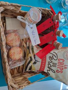 a basket filled with food and a jar of food at Emplacement Top in Alençon
