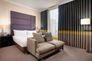 Postel nebo postele na pokoji v ubytování Hilton London Wembley