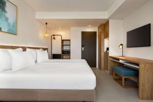 Wyndham Residences Alvor Beach客房内的一张或多张床位