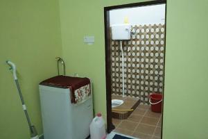 Ένα μπάνιο στο ZZ Homestay +13 φωτογραφίες