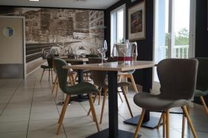 Posezení v ubytování Hotel-Restaurant Stand'Inn + 21 fotografií