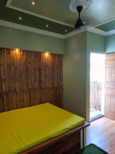 Postel nebo postele na pokoji v ubytování Pravuprasad Homestay